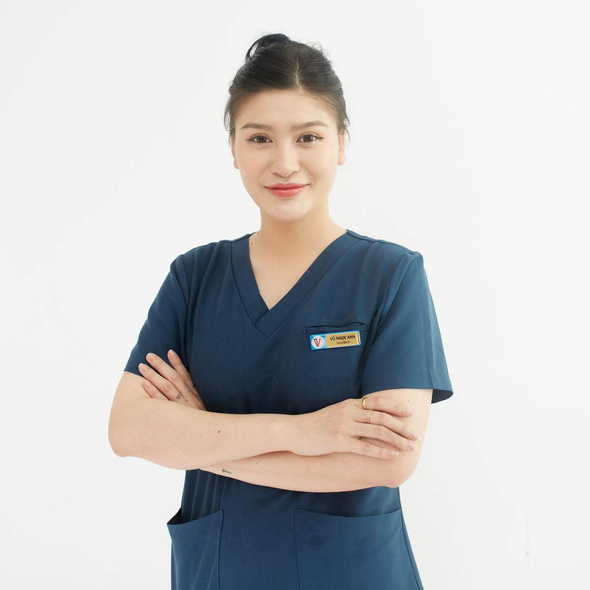 Confident female nurse in medical uniform